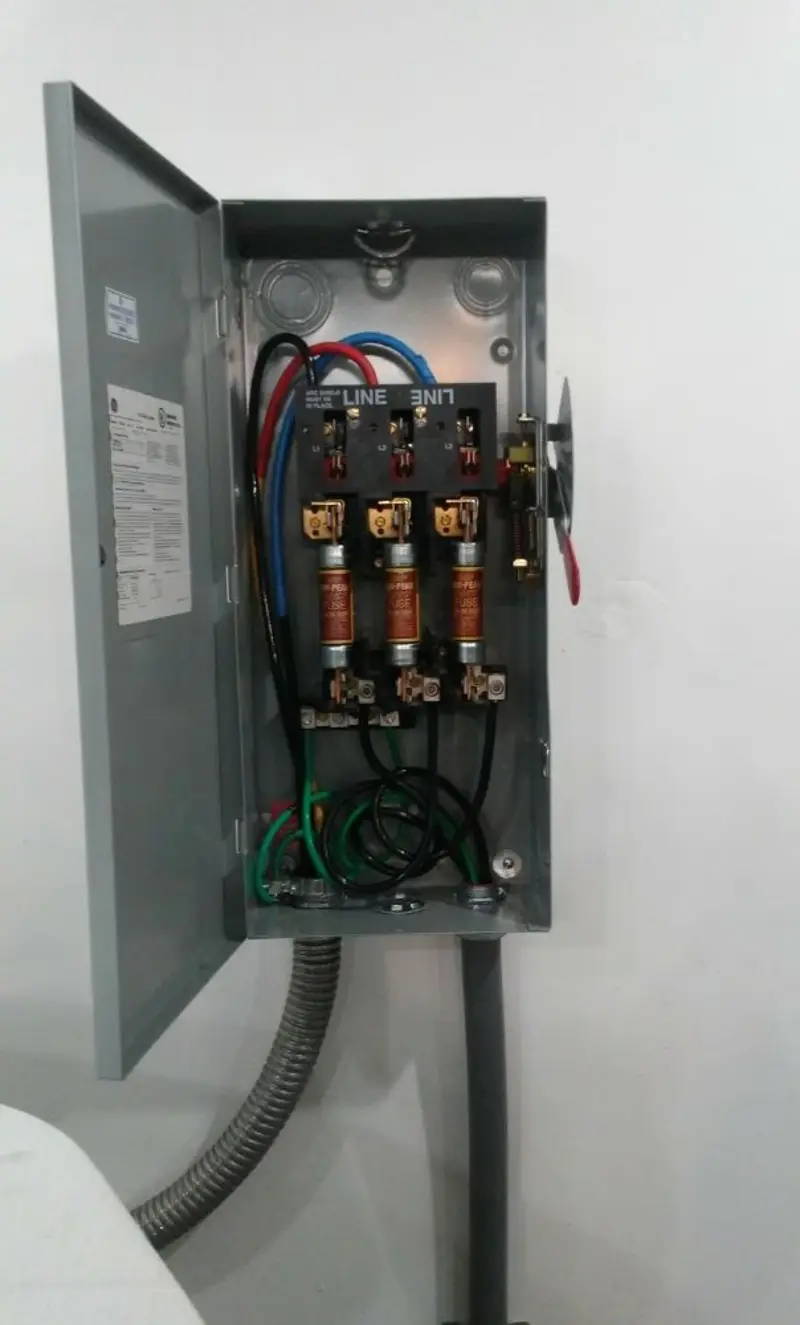 Three-phase disconnect switch installed for Smoke Detector Installation in Clarcona